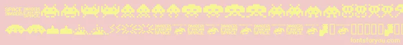 Шрифт Invaders.From.Space.Fontvir.Us – жёлтые шрифты на розовом фоне