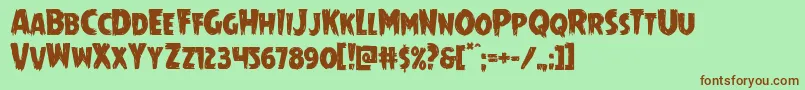 Mrsmonster Font – Brown Fonts on Green Background