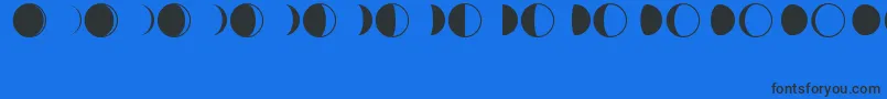 Шрифт MoonPhasesRegular – чёрные шрифты на синем фоне