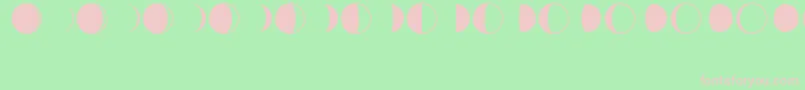 フォントMoonPhasesRegular – 緑の背景にピンクのフォント
