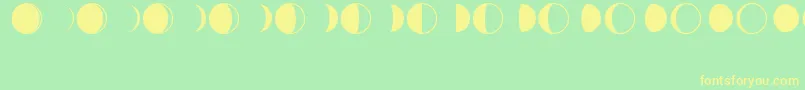 MoonPhasesRegular Font – Yellow Fonts on Green Background