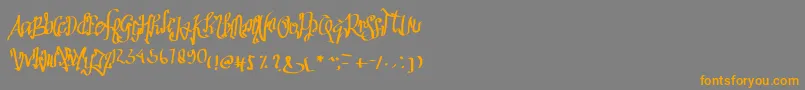 フォントSathas – オレンジの文字は灰色の背景にあります。