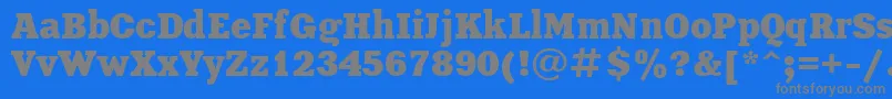 XeniaBold-fontti – harmaat kirjasimet sinisellä taustalla