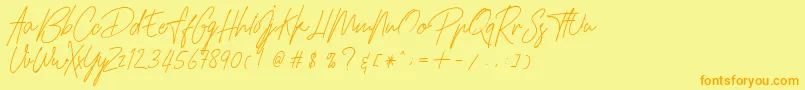 フォントHamilltonDemo – オレンジの文字が黄色の背景にあります。