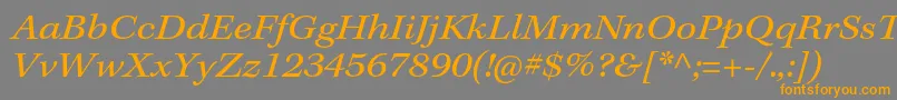 フォントKeplerstdExtit – オレンジの文字は灰色の背景にあります。
