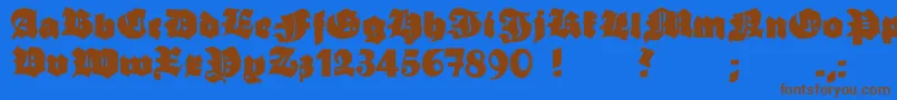 フォントGrobehand – 茶色の文字が青い背景にあります。