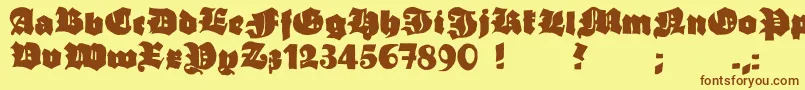 フォントGrobehand – 茶色の文字が黄色の背景にあります。