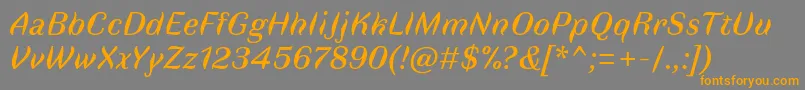 フォントFauneTextItalic – オレンジの文字は灰色の背景にあります。