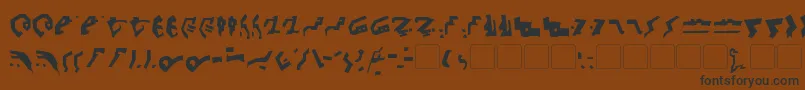 Fonte GiediDecepticonGraffiti – fontes pretas em um fundo marrom