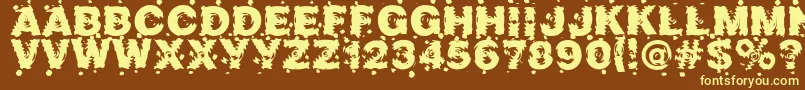 Marusya-fontti – keltaiset fontit ruskealla taustalla