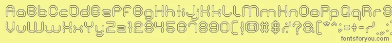フォントStoneRock – 黄色の背景に灰色の文字