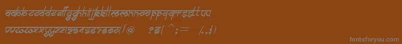 フォントBilingmimarathiItalic – 茶色の背景に灰色の文字