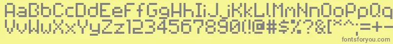 Pixilator Font – Gray Fonts on Yellow Background