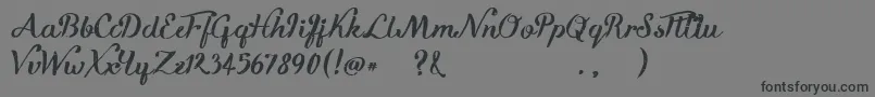 KikeletBrush Font – Black Fonts on Gray Background