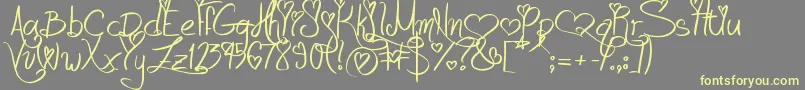 LoveAndPassion Font – Yellow Fonts on Gray Background