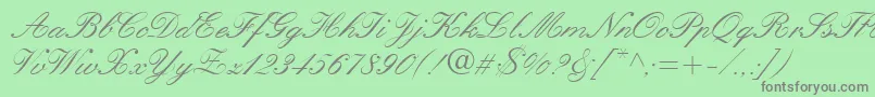 フォントQuillScriptSsi – 緑の背景に灰色の文字