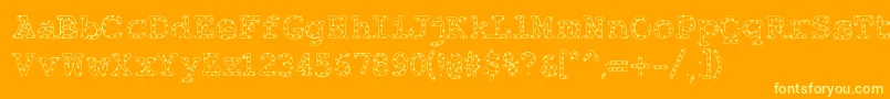 Alphabeticsprinkleslight-Schriftart – Gelbe Schriften auf orangefarbenem Hintergrund