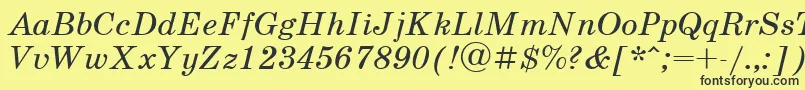 Czcionka UkrainianschoolbookItalic – czarne czcionki na żółtym tle