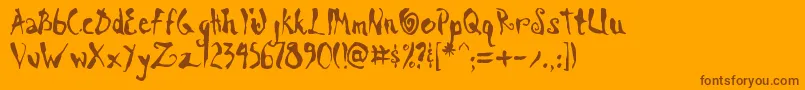 Czcionka Scraa – brązowe czcionki na pomarańczowym tle