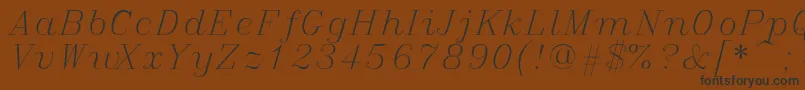 Italicc Font – Black Fonts on Brown Background