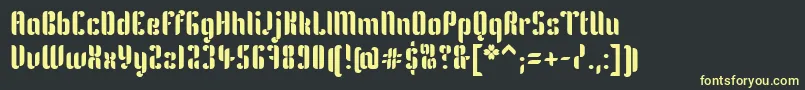 フォントKeniaRegular – 黒い背景に黄色の文字