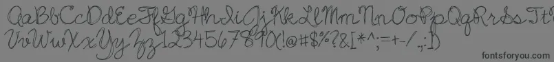 JazzEssay Font – Black Fonts on Gray Background