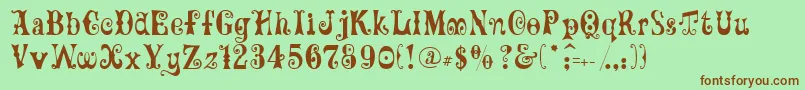 GeFrills Font – Brown Fonts on Green Background