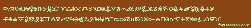 フォントHermeticspellbook – 緑色の文字が茶色の背景にあります。