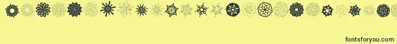 Шрифт PaperSnowflakes – чёрные шрифты на жёлтом фоне