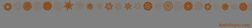 PaperSnowflakes Font – Brown Fonts on Gray Background