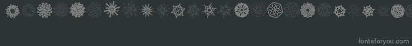 Шрифт PaperSnowflakes – серые шрифты на чёрном фоне