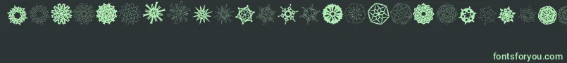 PaperSnowflakes Font – Green Fonts on Black Background