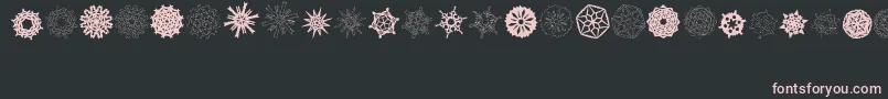 PaperSnowflakes-Schriftart – Rosa Schriften auf schwarzem Hintergrund