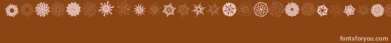 PaperSnowflakes Font – Pink Fonts on Brown Background