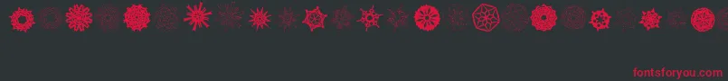 フォントPaperSnowflakes – 黒い背景に赤い文字