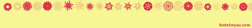 PaperSnowflakes-Schriftart – Rote Schriften auf gelbem Hintergrund