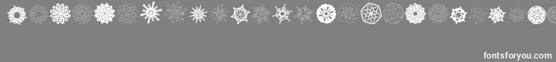 Подробнее о шрифте PaperSnowflakes Шрифт PaperSnowflakes – белые шрифты на сером фоне