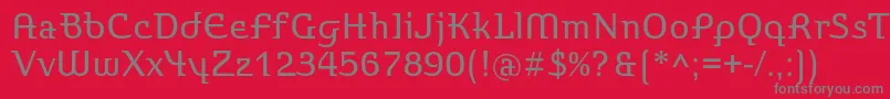 フォントStroganovc – 赤い背景に灰色の文字