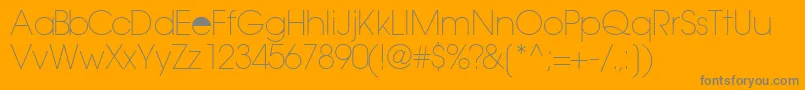 TrendexlightsskRegular-Schriftart – Graue Schriften auf orangefarbenem Hintergrund