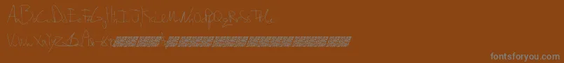 Ripedusk-Schriftart – Graue Schriften auf braunem Hintergrund