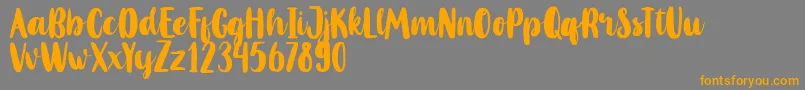 MahoniFreePersonalUse Font – Orange Fonts on Gray Background