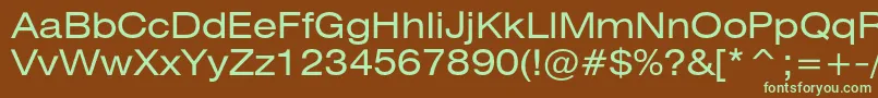 フォントHeliosextc – 緑色の文字が茶色の背景にあります。