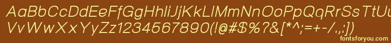 NeogramItalic-fontti – keltaiset fontit ruskealla taustalla