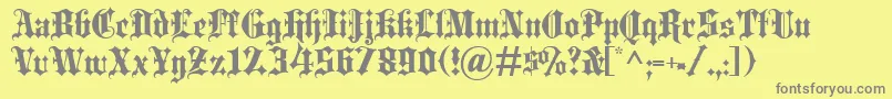 Czcionka BlackletterExtrabold – szare czcionki na żółtym tle