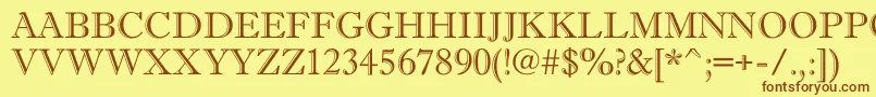 Fonte AAntiquetitulgr – fontes marrons em um fundo amarelo