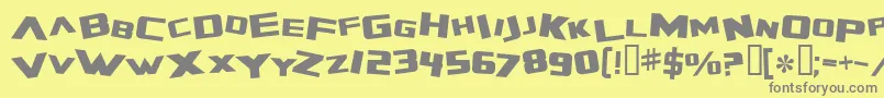 ZeroGravityExtended-fontti – harmaat kirjasimet keltaisella taustalla