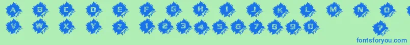 Fonte DeadCircuitregular – fontes azuis em um fundo verde