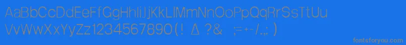 Arctik1-Schriftart – Graue Schriften auf blauem Hintergrund