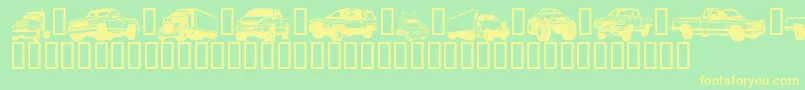 Trucjs Font – Yellow Fonts on Green Background