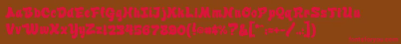 フォントFinkbrush – 赤い文字が茶色の背景にあります。